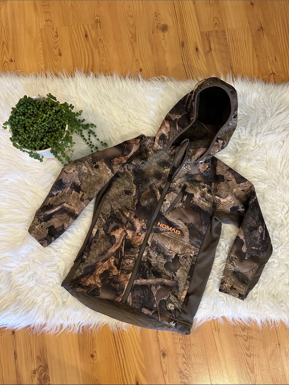 Camo lined Nomad kids jacket. Size youth small.